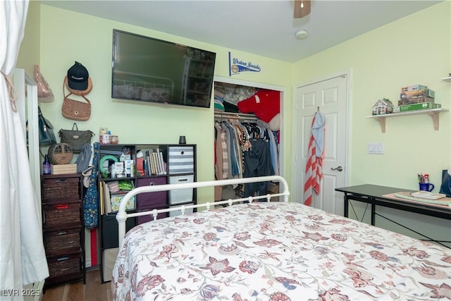 bedroom with a closet and wood finished floors