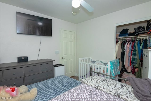 bedroom featuring a ceiling fan and a closet