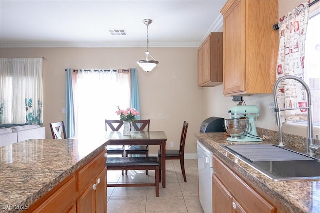 kitchen with light tile patterned floors, white dishwasher, a sink, visible vents, and crown molding