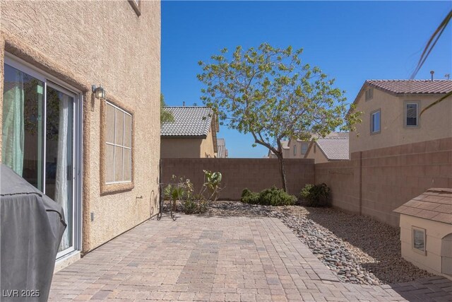 view of patio with a fenced backyard