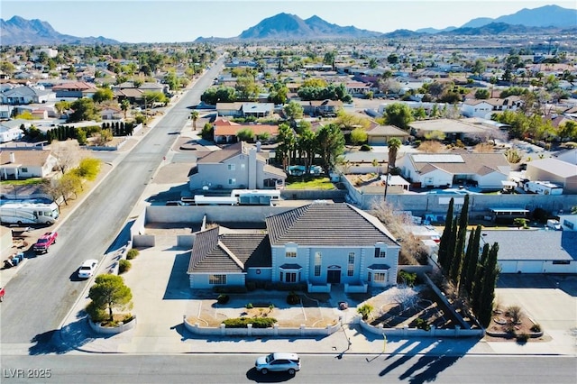 bird's eye view with a mountain view and a residential view