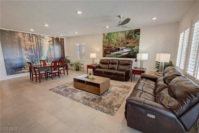 living area featuring a ceiling fan, recessed lighting, and tile patterned floors