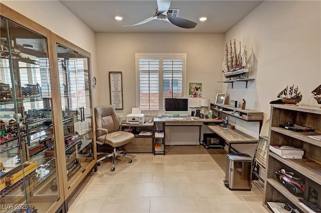 office area featuring light tile patterned floors, visible vents, a healthy amount of sunlight, and ceiling fan