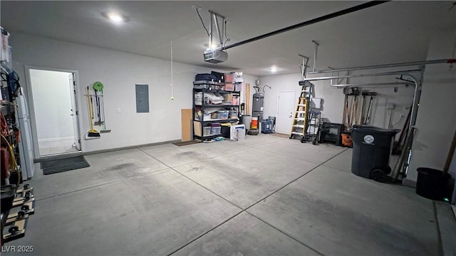 garage featuring water heater, electric panel, and a garage door opener