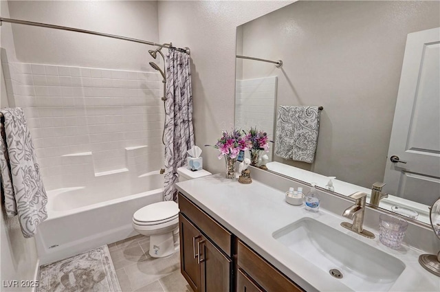 full bath with toilet, tile patterned flooring, shower / bath combination with curtain, and vanity