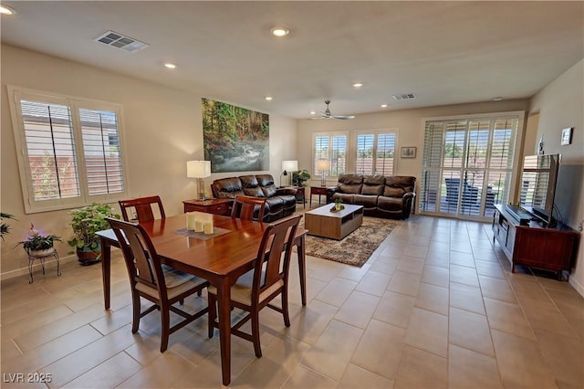 dining room featuring light tile patterned floors, baseboards, visible vents, and recessed lighting