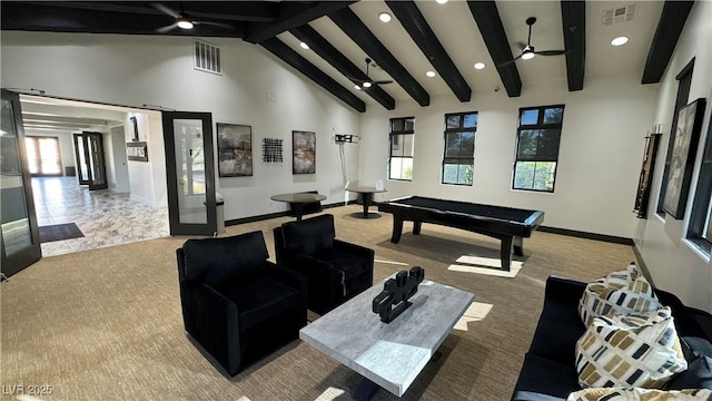 rec room with beamed ceiling, visible vents, high vaulted ceiling, and a ceiling fan