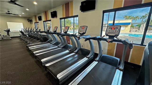 workout area featuring recessed lighting and a ceiling fan