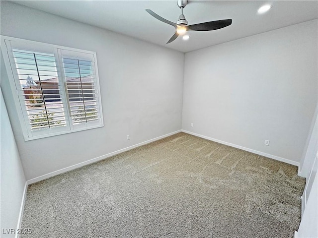 spare room with baseboards, recessed lighting, carpet flooring, and a ceiling fan