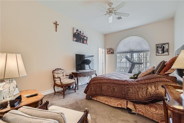 bedroom with a ceiling fan, carpet flooring, visible vents, and baseboards