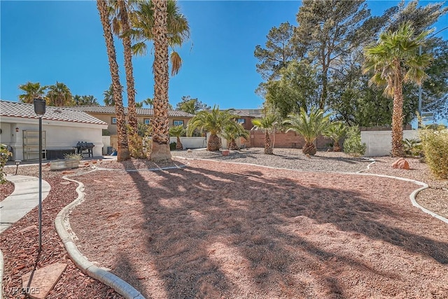 view of yard featuring fence