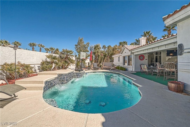 view of pool featuring a fenced in pool, a patio area, and a fenced backyard