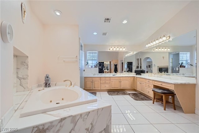 bathroom with tile patterned flooring, recessed lighting, vanity, visible vents, and a whirlpool tub