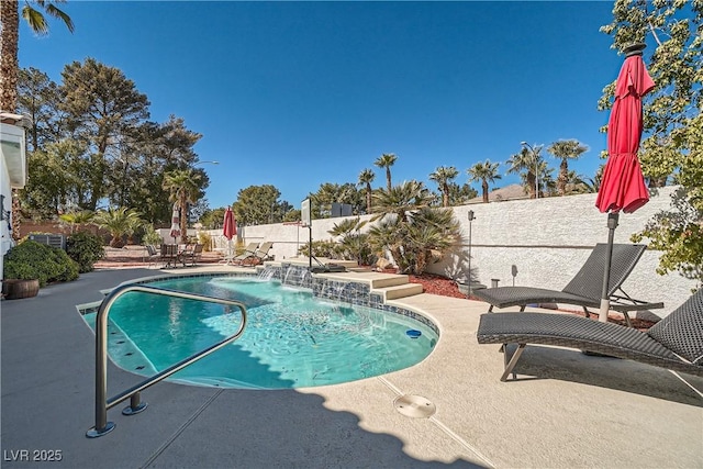 view of pool with a fenced in pool, a patio area, and a fenced backyard