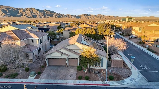 bird's eye view with a mountain view and a residential view