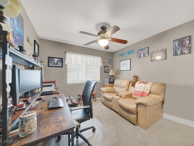 home office with ceiling fan, baseboards, and carpet flooring