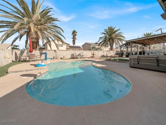 view of swimming pool featuring a patio area, a fenced backyard, and a fenced in pool