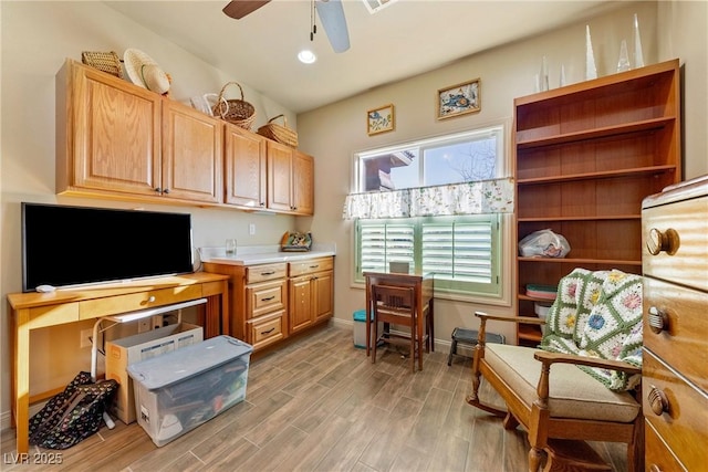 office area featuring recessed lighting, baseboards, a ceiling fan, and wood finish floors