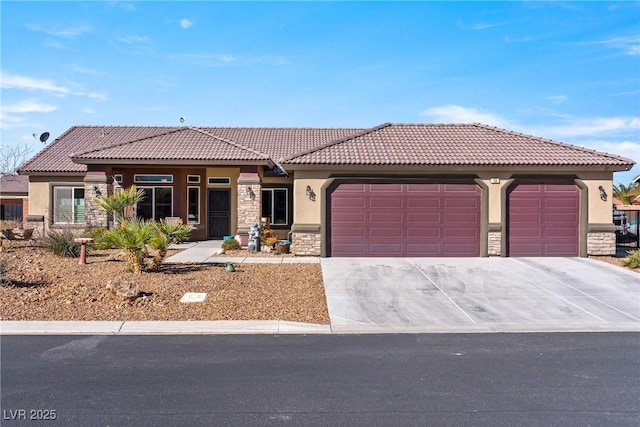 view of front of home with a garage, stone siding, driveway, and stucco siding