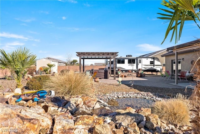 view of yard featuring a patio and a pergola