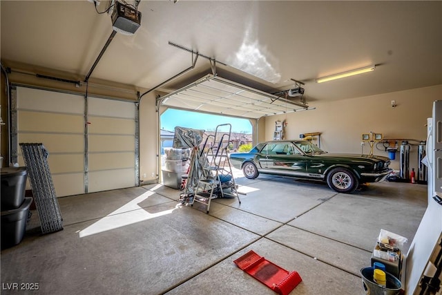 garage featuring a garage door opener