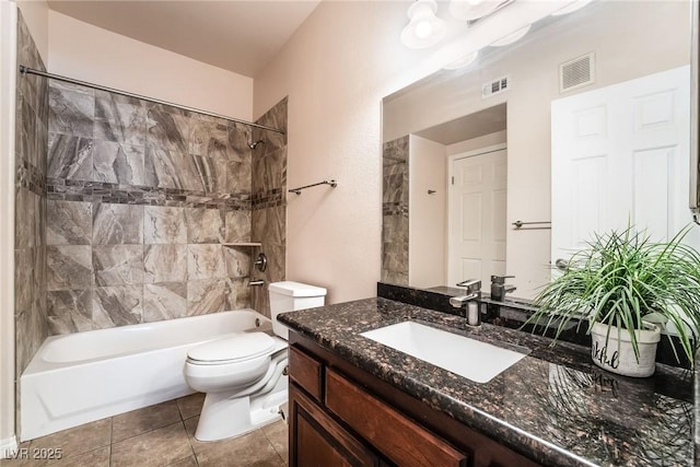 bathroom featuring visible vents, toilet, tile patterned floors, vanity, and shower / bathing tub combination