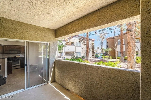 balcony featuring a residential view