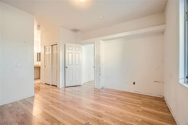 empty room with light wood-type flooring