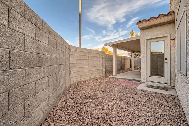 view of yard with a patio and a fenced backyard