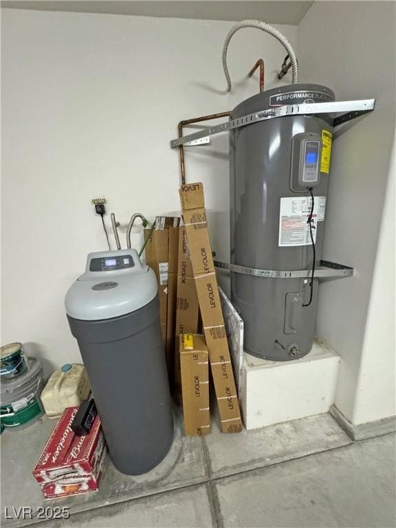 utility room featuring water heater