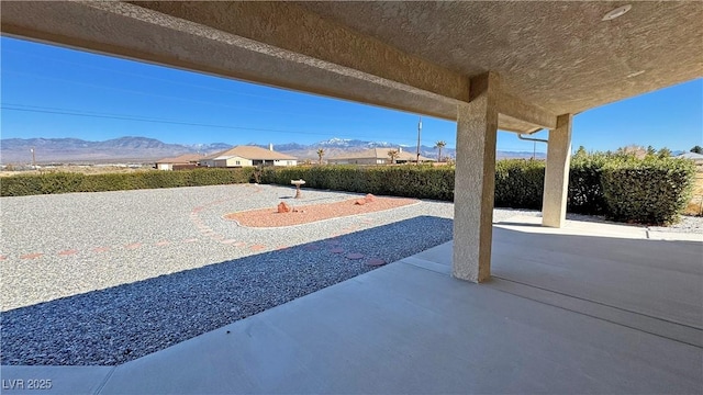 view of patio with a mountain view