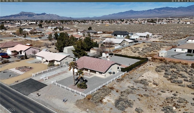 birds eye view of property featuring a residential view and a mountain view