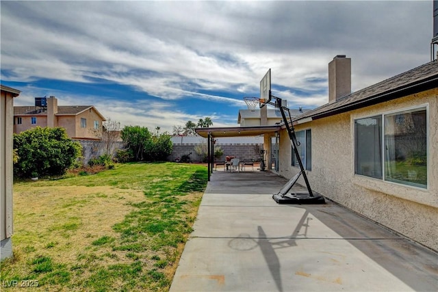 view of yard with a patio area and a fenced backyard