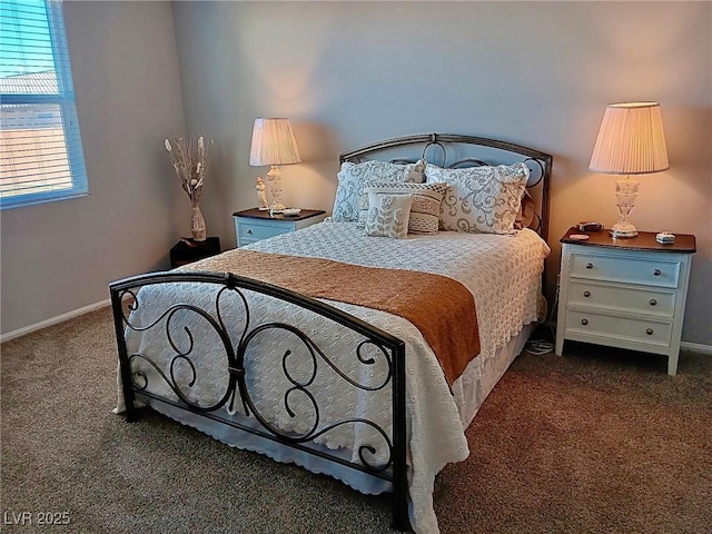 carpeted bedroom featuring baseboards