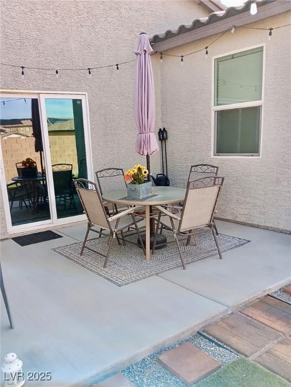 view of patio / terrace with fence and outdoor dining area