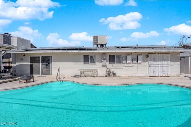 community pool featuring a patio