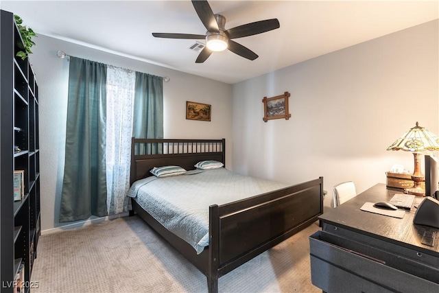 carpeted bedroom featuring a ceiling fan