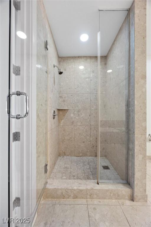 bathroom with a shower stall