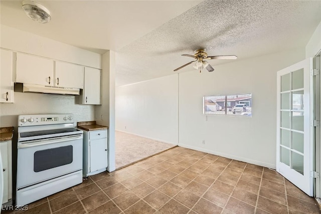 kitchen featuring visible vents, a textured ceiling, white electric range oven, and under cabinet range hood