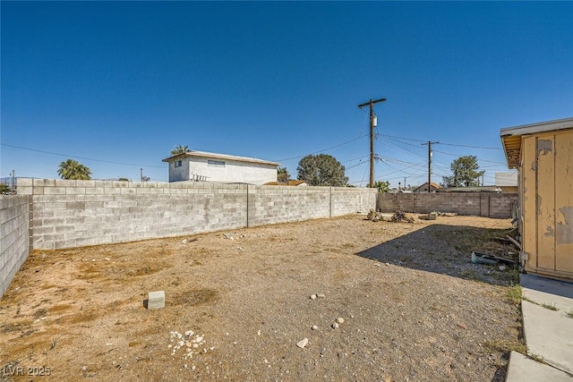 view of yard featuring a fenced backyard