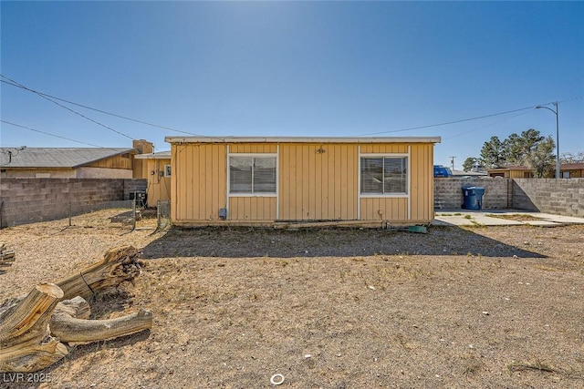 exterior space featuring a fenced backyard