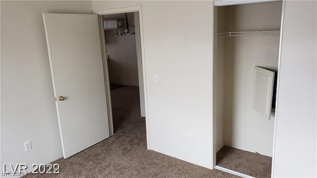 unfurnished bedroom featuring carpet