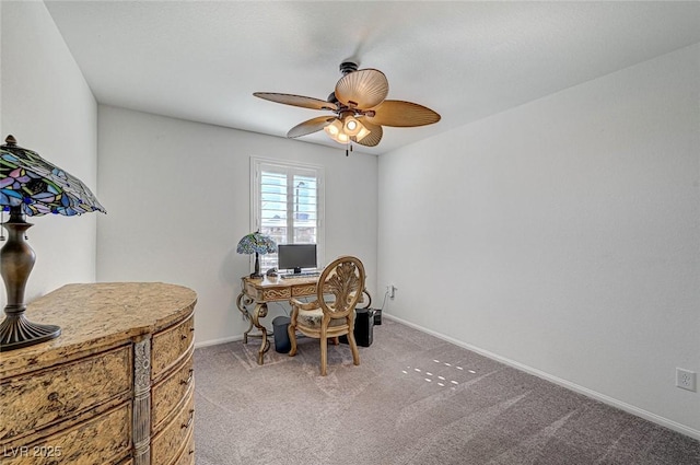 office with ceiling fan, baseboards, and light colored carpet