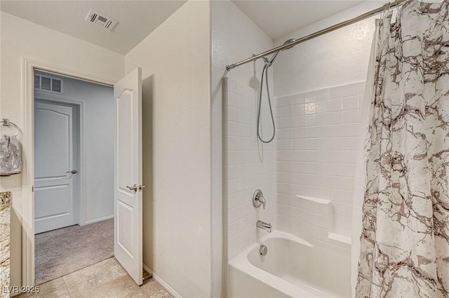 full bath featuring shower / bath combination with curtain, visible vents, and baseboards