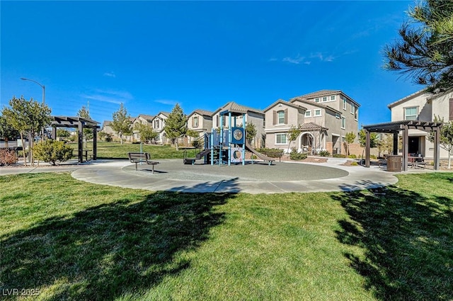 community jungle gym with a yard, a residential view, and a pergola