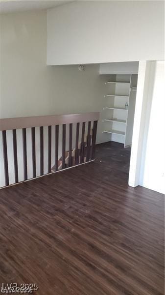 hall featuring dark wood-style flooring