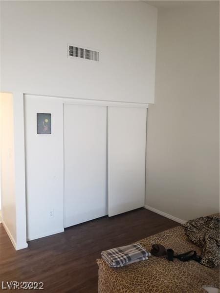 interior details featuring wood finished floors and visible vents