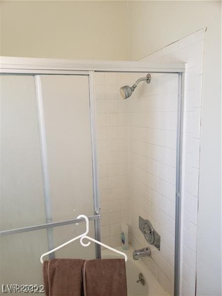 bathroom with shower / bathtub combination