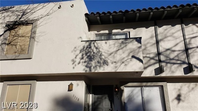 view of property exterior with stucco siding