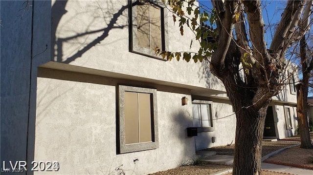 view of property exterior with stucco siding